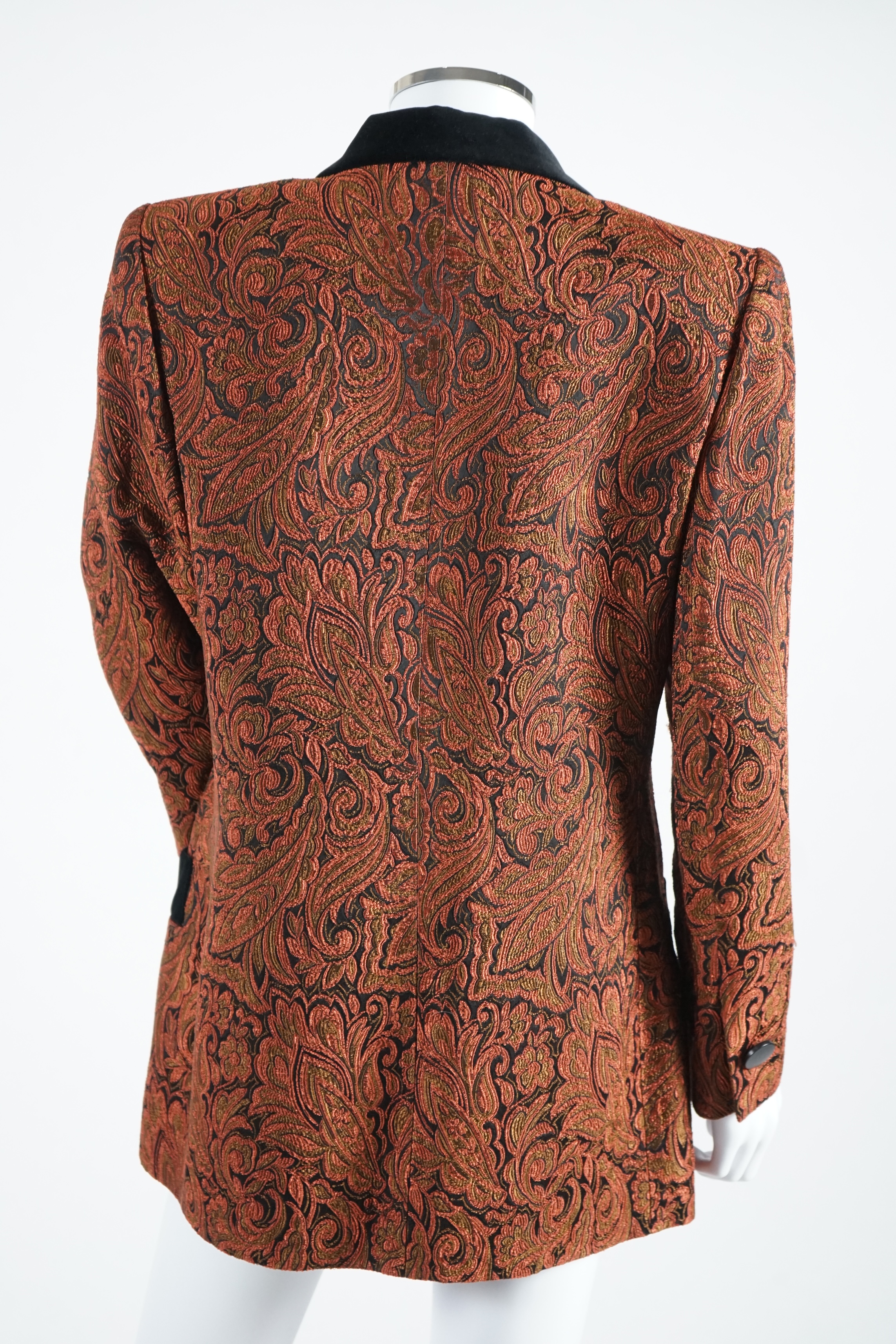A vintage Yves Saint Laurent variation lady's paisley jacket with black velvet collar, buttons and pocket detail, F 42 (UK 14). Proceeds to Happy Paws Puppy Rescue